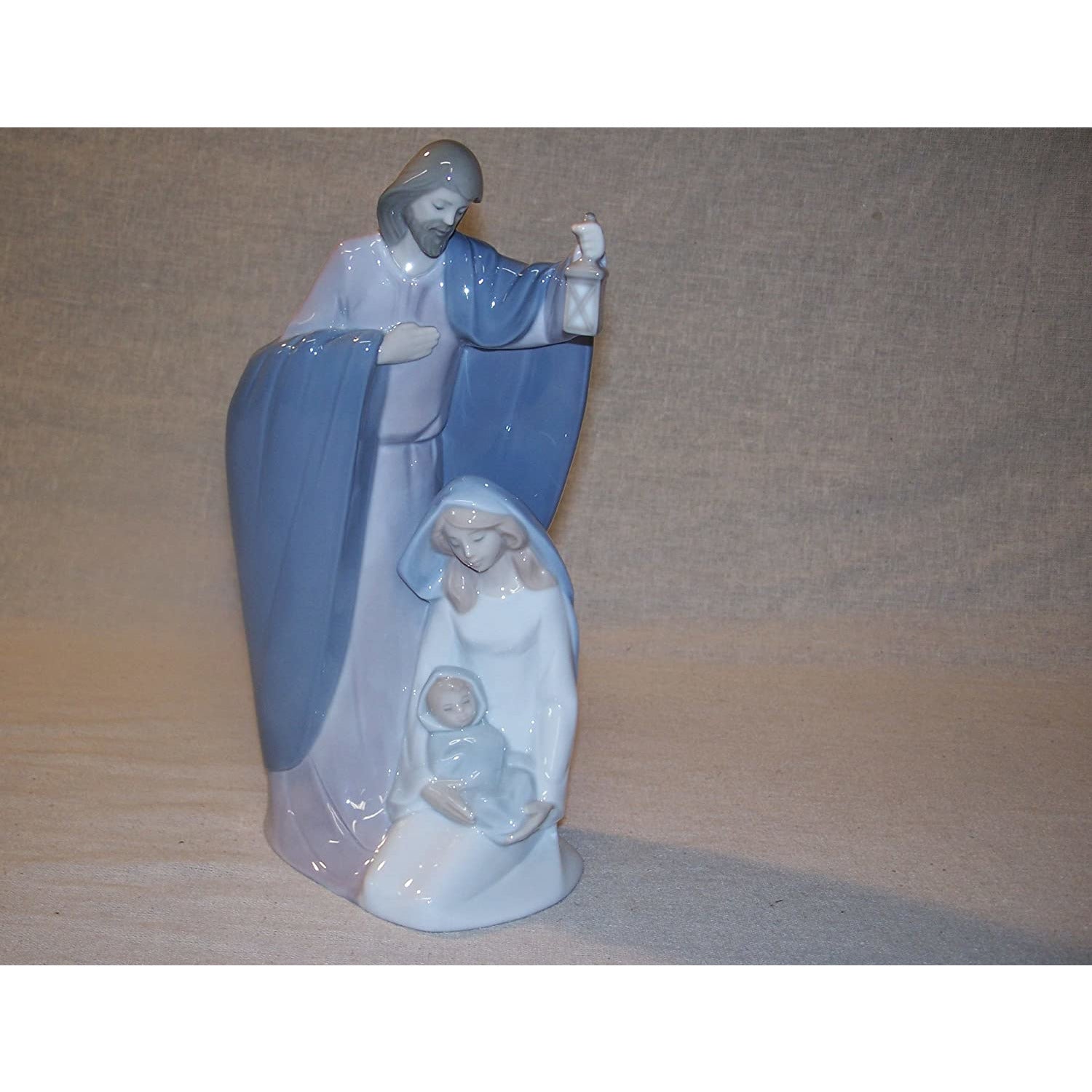 Nao by Lladro Collectible Porcelain Figurine: THE NATIVITY OF JESUS - 9 1/2" tall - Joseph, Mary, and baby Jesus...