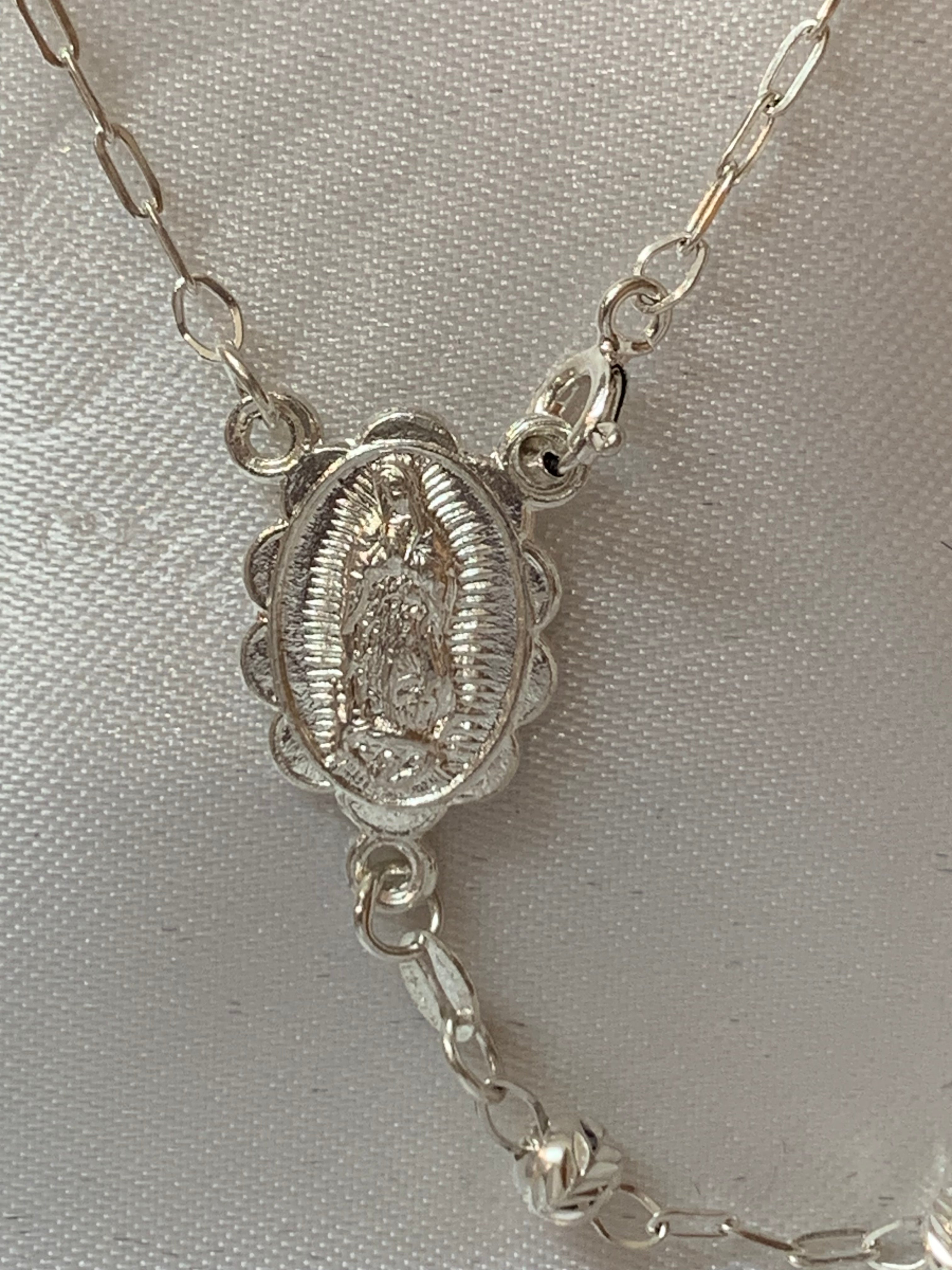 Silver Rosary with Saint Benedict / or Our Lady of Guadalupe medal in the middle